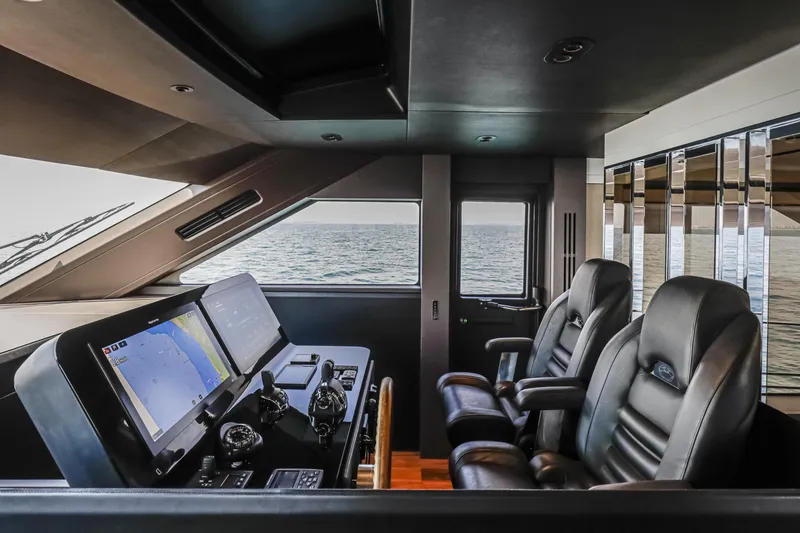 Slide: The Image of Luxurious helm of 2026 Cranchi Sessantasette 67 yacht with advanced navigation systems. - 51