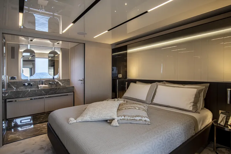 Slide: The Image of Luxurious bedroom interior of 2026 Cranchi Sessantasette 67 yacht with elegant design. - 64