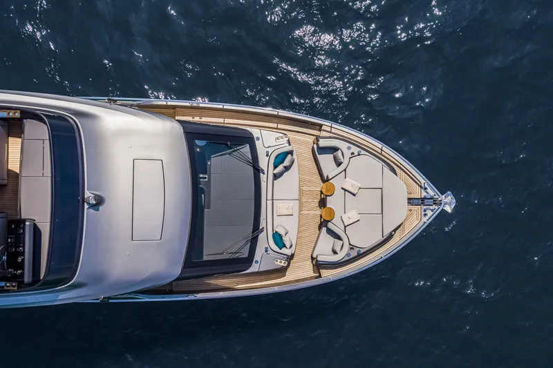Slide: The Image of Top view of 2026 Cranchi Sessantasette 67 yacht on open water. - 7