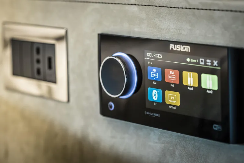 Slide: The Image of Control panel on 2026 Cranchi Sessantasette 67 yacht with audio source options. - 77