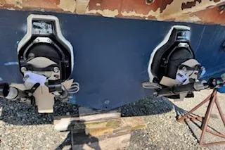 Slide: The Image of 2007 Sea Ray 290 Amberjack boat interior with helm, seating, and towel on rail. - 11