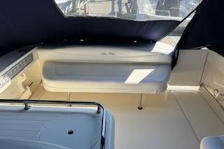 Slide: The Image of 2007 Sea Ray 290 Amberjack boat stern with dual outdrives on display. - 4