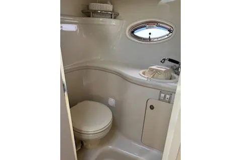 Slide: The Image of Engine compartment of a 2007 Sea Ray 290 Amberjack, featuring a Kohler generator. - 7