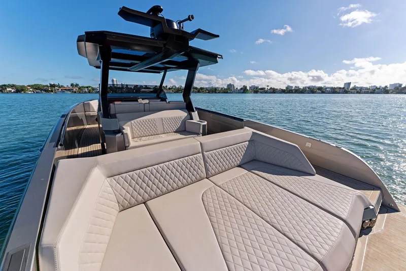 Slide: The Image of Luxurious 2022 Vanquish Yachts VQ40 with spacious seating on a sunny day. - 32