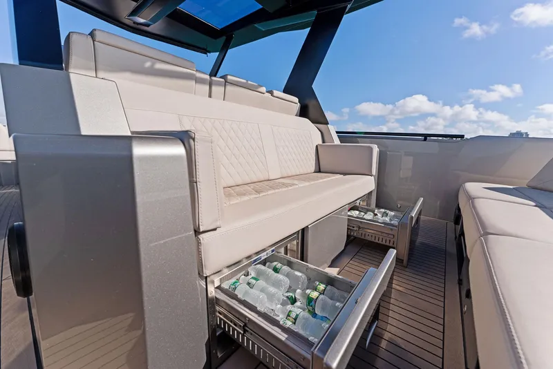 Slide: The Image of Luxurious 2022 Vanquish Yachts VQ40 interior with built-in beverage storage drawers. - 33