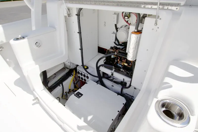 Slide: The Image of Engine compartment of 2026 Regulator 37 boat, showcasing mechanical components and wiring. - 3