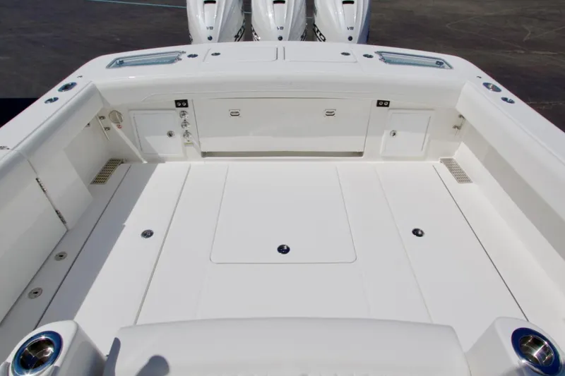 Slide: The Image of Spacious deck of 2026 Regulator 37 boat with clean, white finish. - 4
