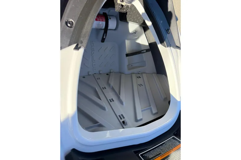 Slide: The Image of 2021 Seadoo GTI90 storage compartment with fire extinguisher, showcasing interior design. - 17