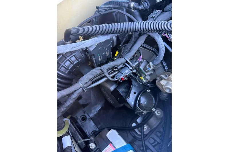 Slide: The Image of 2021 Seadoo GTI90 engine compartment with visible wiring and components. - 20