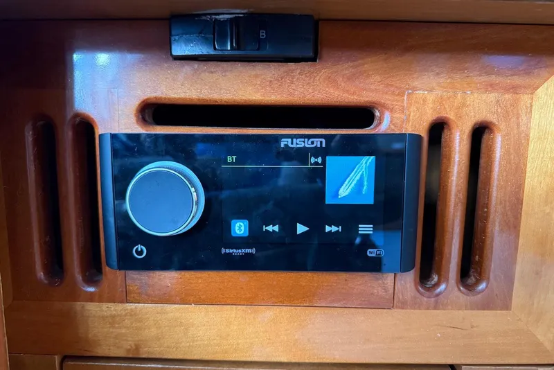 Slide: The Image of Fusion audio system in 2004 Navigator 4800, mounted on wooden panel. - 59