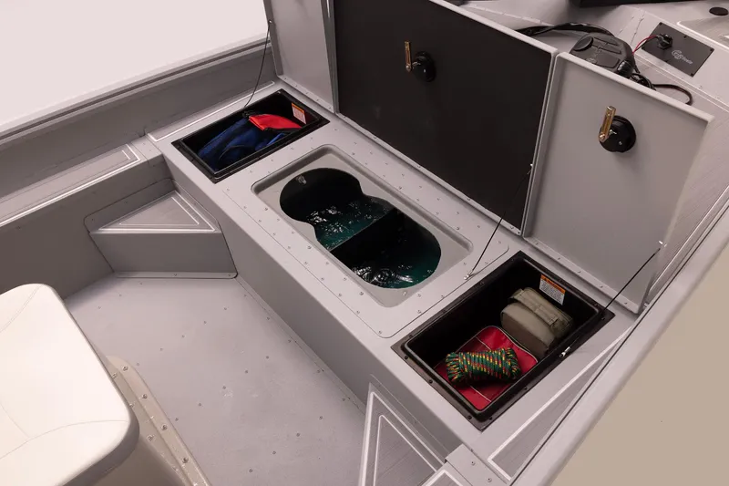 Slide: The Image of Interior of 2026 G3 Bay 17 boat with storage compartments and seating. - 18