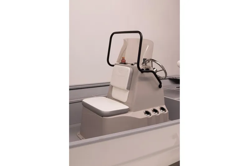 Slide: The Image of 2026 G3 Bay 17 boat console with steering wheel and cushioned seat. - 19