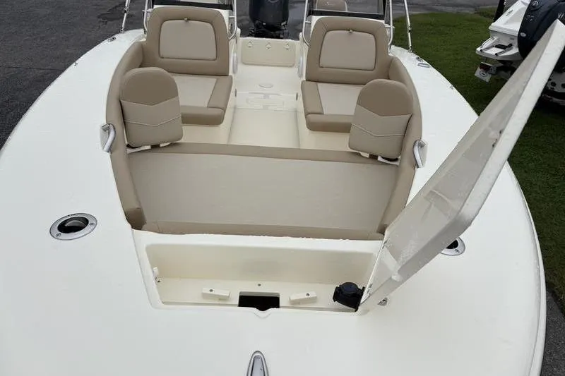 Slide: The Image of 2026 Scout 195 Sport Dorado boat interior with beige seating and modern design. - 19
