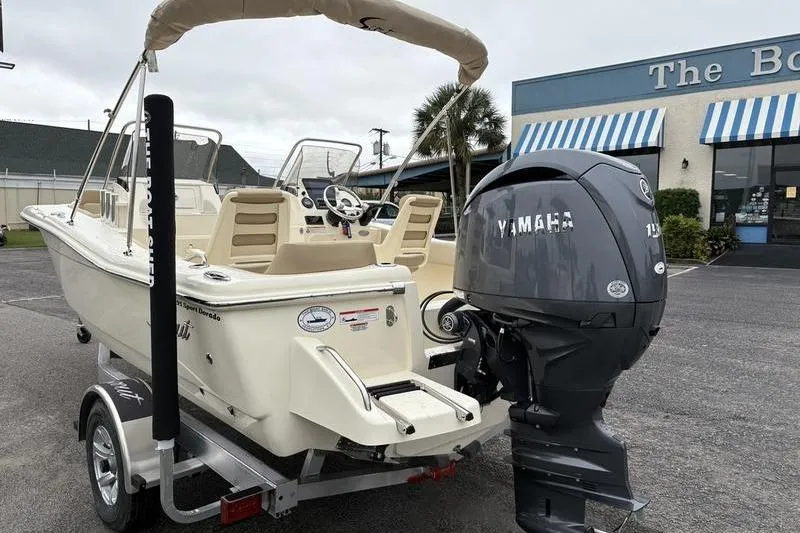 The Image of 2026 Scout 195 Sport Dorado boat on trailer at authorized dealer, The Boat Shed. - 2