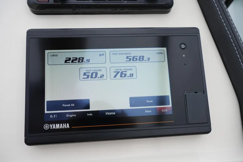 Slide: The Image of Yamaha display showing fuel usage and trip data on 2022 Grady-White Freedom 235 boat. - 30