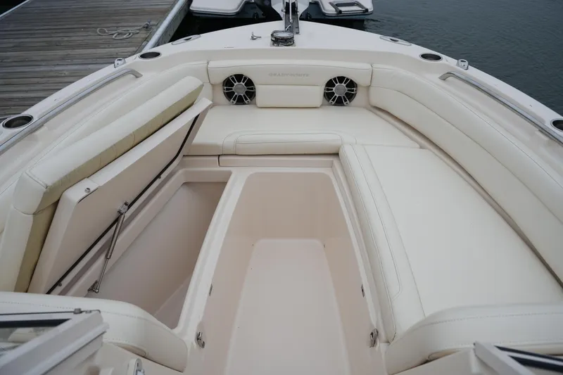 Slide: The Image of 2022 Grady-White Freedom 235 boat interior with spacious seating and storage. - 36