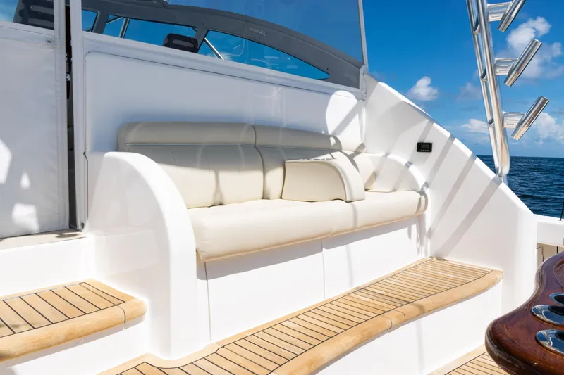 Slide: The Image of Luxurious seating on 2021 Viking 44 Open yacht with ocean view. - 12