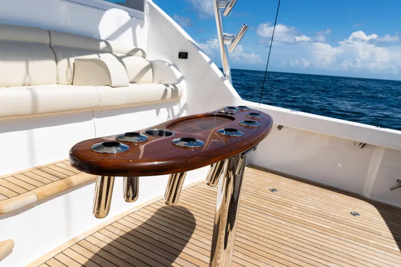 Slide: The Image of Luxury Viking 44 Open yacht deck with rod holders, ocean view, 2021 model. - 16