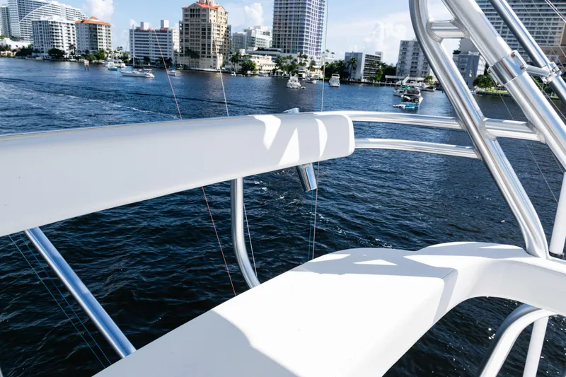 Slide: The Image of 2021 Viking 44 Open yacht overlooking city waterfront and marina. - 35