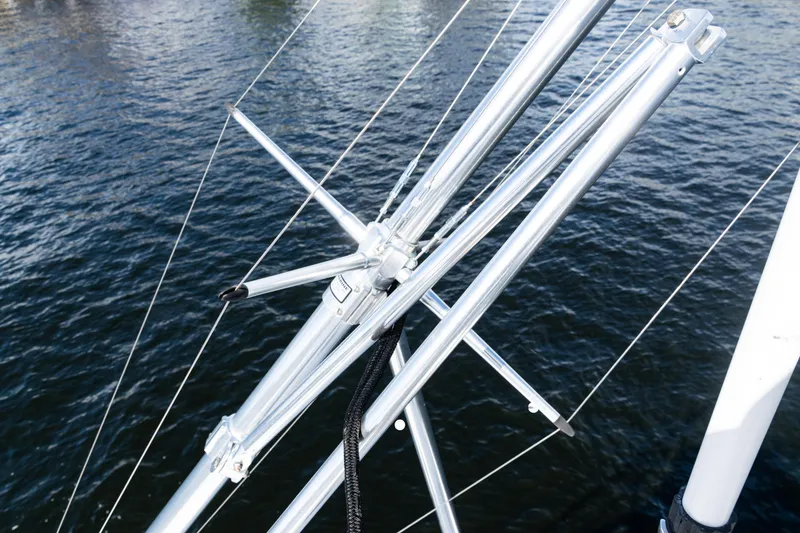 Slide: The Image of Close-up of 2021 Viking 44 Open yacht's metal rigging over water. - 36