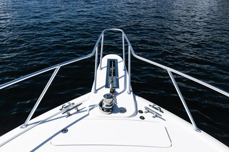 Slide: The Image of Bow view of 2021 Viking 44 Open yacht on calm water. - 48