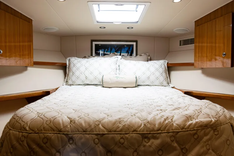 Slide: The Image of Luxurious bedroom interior of 2021 Viking 44 Open yacht with elegant bedding. - 65