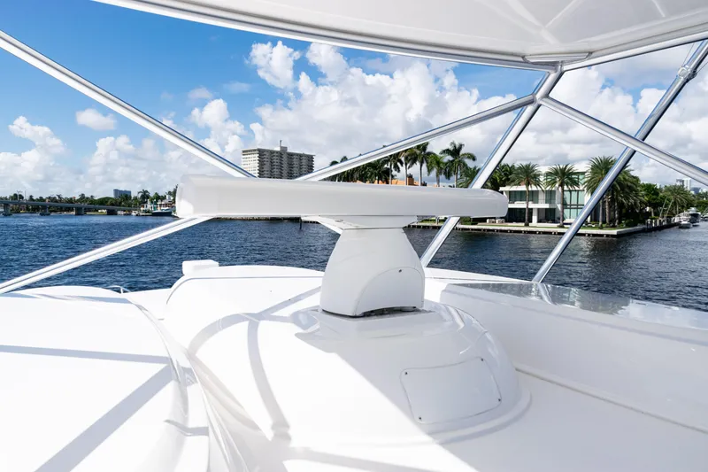 Slide: The Image of 2021 Viking 44 Open yacht radar system with waterfront view and palm trees. - 91