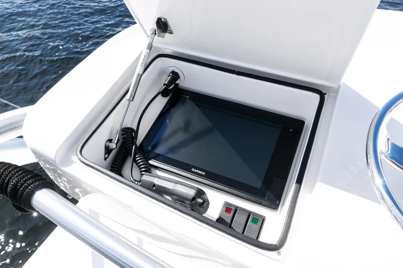 Slide: The Image of Control panel of 2021 Viking 44 Open yacht with Garmin display and controls. - 93