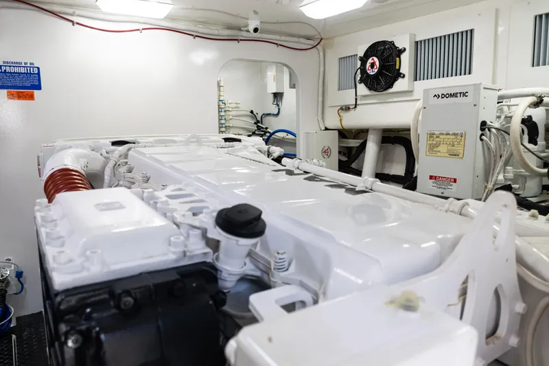 Slide: The Image of Engine room of 2021 Viking 44 Open yacht, featuring modern equipment and clean design. - 96