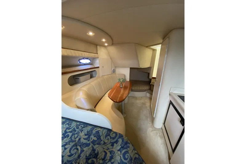 Slide: The Image of Interior of 2003 Cruisers Yachts 2870 Express with cozy seating and elegant design. - 15