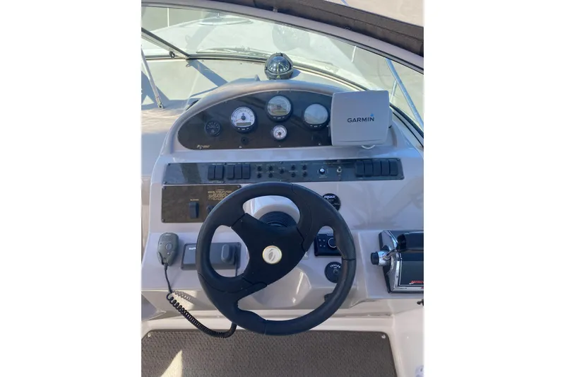 Slide: The Image of Helm of 2003 Cruisers Yachts 2870 Express with Garmin navigation system. - 4
