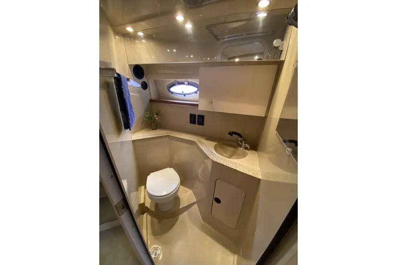 Slide: The Image of Luxurious bathroom in 2003 Cruisers Yachts 2870 Express with modern fixtures and lighting. - 8