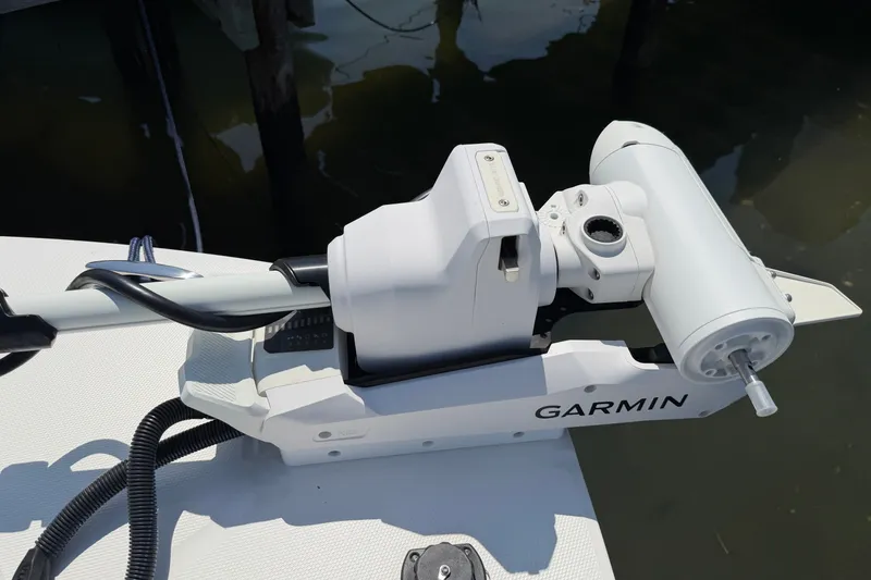 Slide: The Image of Garmin marine equipment on 2025 Regulator 30XO boat, docked by the water. - 55