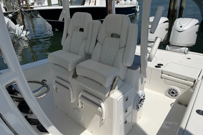 Slide: The Image of 2025 Regulator 30XO boat interior with luxurious seating and modern design. - 43