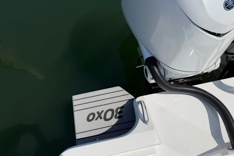 Slide: The Image of 2025 Regulator 30XO boat engine and deck detail, featuring sleek design and modern features. - 17