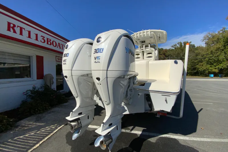 Slide: The Image of 2025 Cobia 285 Open Center Console with twin Yamaha 300 V6 engines at RT113 Boat Sales. - 10
