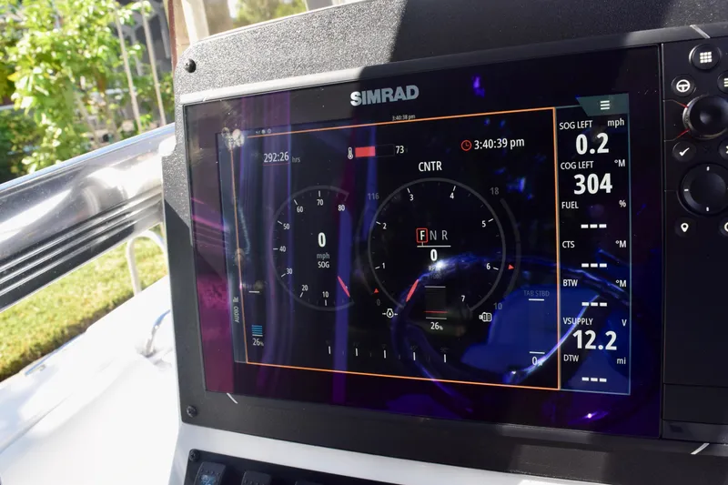 Slide: The Image of Simrad display on 2018 Sea Hunt Ultra 211 boat, showing navigation and engine data. - 37