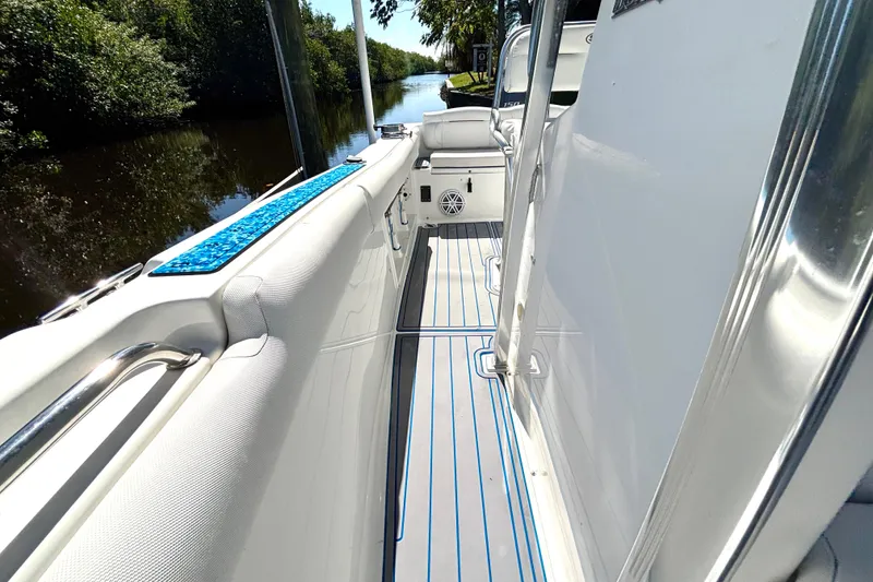 Slide: The Image of 2018 Sea Hunt Ultra 211 boat interior with sleek design and comfortable seating. - 82