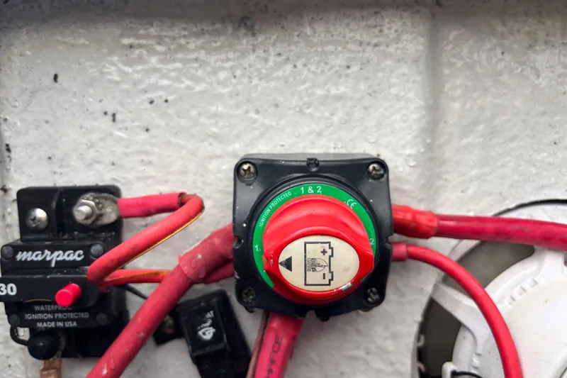Slide: The Image of Battery switch and wiring on 2018 Sea Hunt Ultra 211 boat. - 95