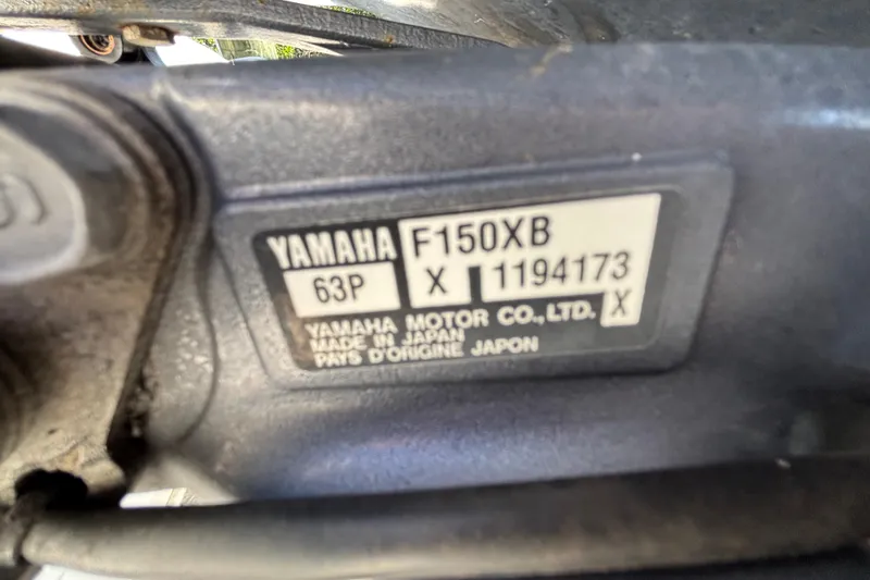 Slide: The Image of Yamaha F150XB engine label on 2018 Sea Hunt Ultra 211 boat, made in Japan. - 99