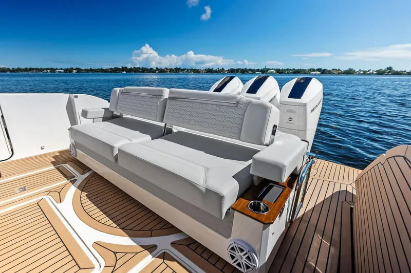 Slide: The Image of Luxury seating on 2024 Tiara Yachts 48 LS, featuring elegant design and powerful engines. - 22