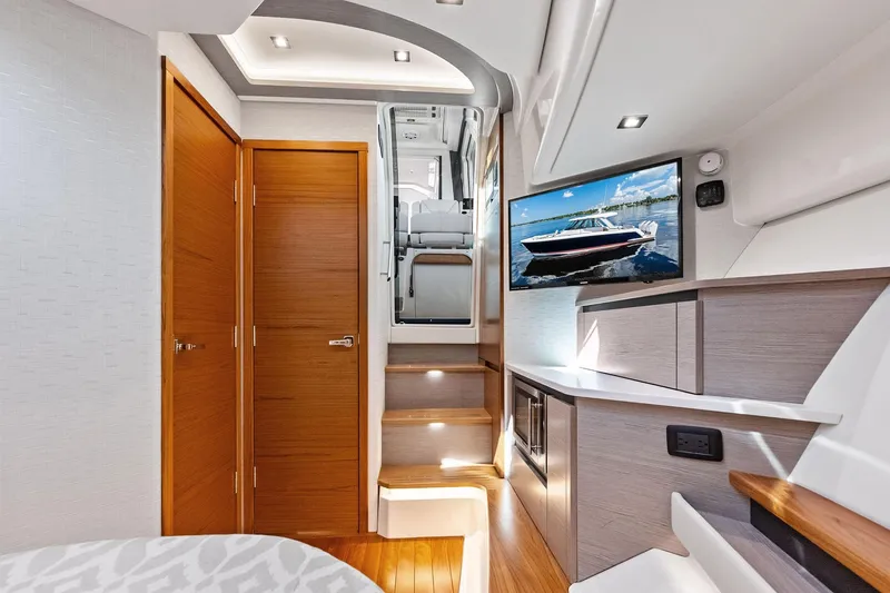 Slide: The Image of Luxurious interior of 2024 Tiara Yachts 48 LS, featuring modern design and elegant wood finishes. - 43