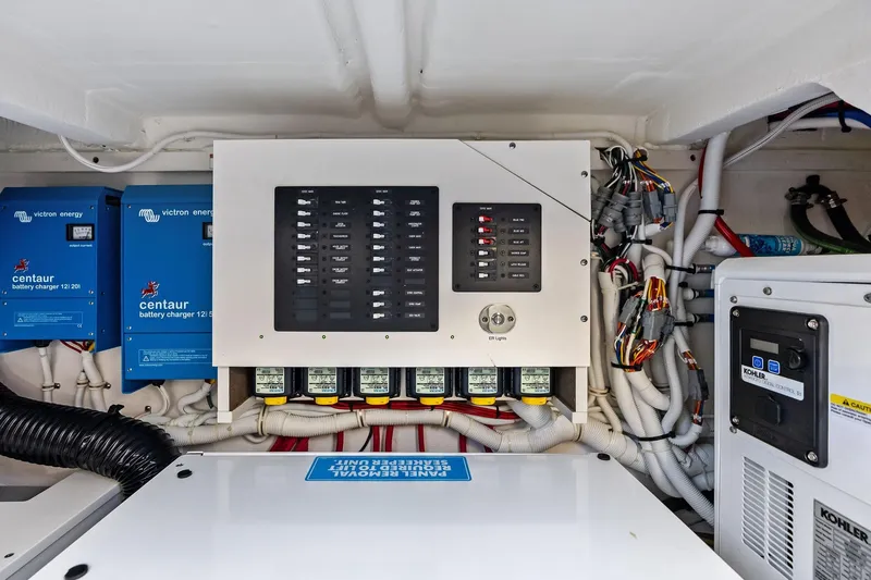 Slide: The Image of Electrical system of 2024 Tiara Yachts 48 LS, featuring Victron Energy components. - 56