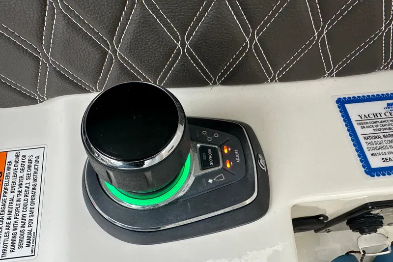 Slide: The Image of Control panel of 2019 Sea Ray SLX 350 Outboard with leather stitching detail. - 25