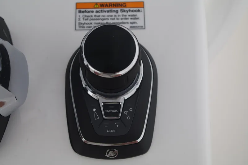 Slide: The Image of Joystick control panel on 2025 Valhalla Boatworks V-33 with Skyhook feature. - 18