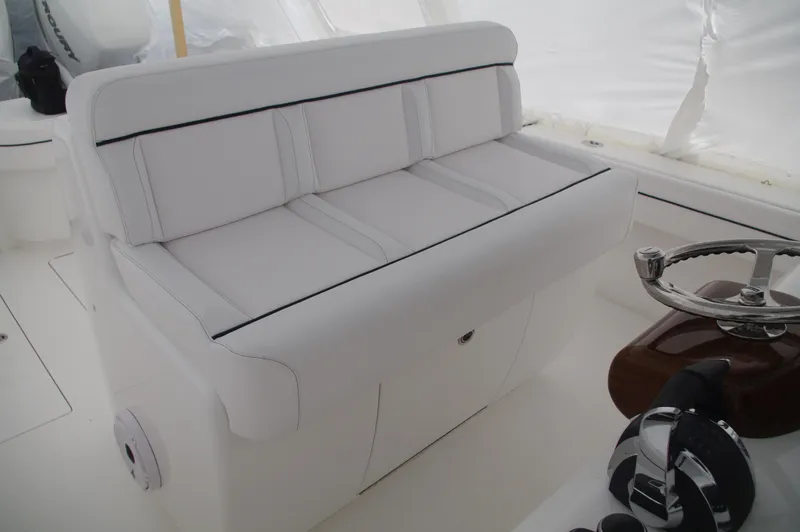 Slide: The Image of 2025 Valhalla Boatworks V-33 interior seating and steering wheel. - 24
