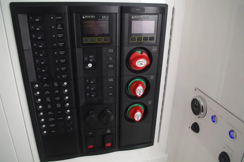 Slide: The Image of Control panel of 2025 Valhalla Boatworks V-33 with switches and displays. - 27
