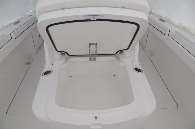 Slide: The Image of Valhalla Boatworks V-33 2025 model open storage compartment. - 31