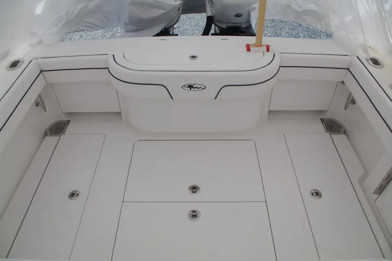 Slide: The Image of 2025 Valhalla Boatworks V-33 deck with storage compartments and seating. - 39