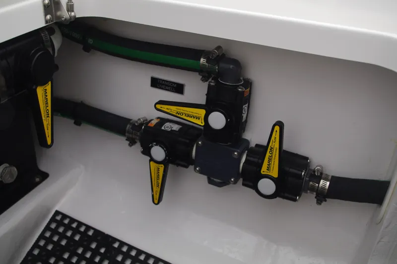 Slide: The Image of Valhalla Boatworks V-33 2025 model plumbing system with valves and hoses. - 43